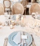 French Wedding Reception Place Setting
Photography: Mantas Kubilinskas Photography
Read More:
http://www.insideweddings.com/weddings/sophisticated-ceremony-ballroom-reception-in-washington-dc/1296/ wedding reception place setting light blue charger plate grey napkin place card candles cane chair