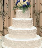 Unique Cake Design
Photography: Mitch Burmeister %26 Scott Preston
Read More:
http://www.insideweddings.com/weddings/glamorous-blue-white-wedding-at-the-bel-air-bay-club/104/ Four layer cake with inscription and flowers