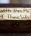Rustic Jewelry Box
Photography: D. Park Photography
Read More:
http://www.insideweddings.com/weddings/rustic-spring-wedding-in-southern-california/454/ Wood jewelry box carved "With This Ring, I Thee Wed"