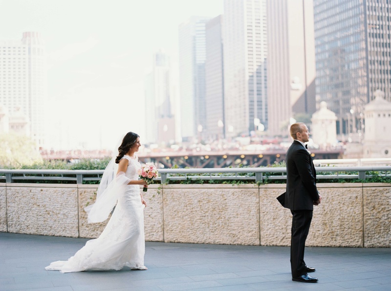 "First Look" in Chicago, Illinois
Photography: Amanda Sudimack for Artisan Events
Read More:
http://www.insideweddings.com/weddings/customized-chicago-wedding-with-pink-blush-marsala-color-palette/911/ Bride sneaks up behind groom in tuxedo during first look in Chicago