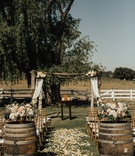 Wine Barrels at Aisle Entrance
Photography: Heirlume Photography
Read More:
http://www.insideweddings.com/weddings/elegant-personalized-wedding-with-adventure-motif-in-malibu/1308/ ceremony at saddlerock ranch with wine barrels at the base of aisle with flower petals