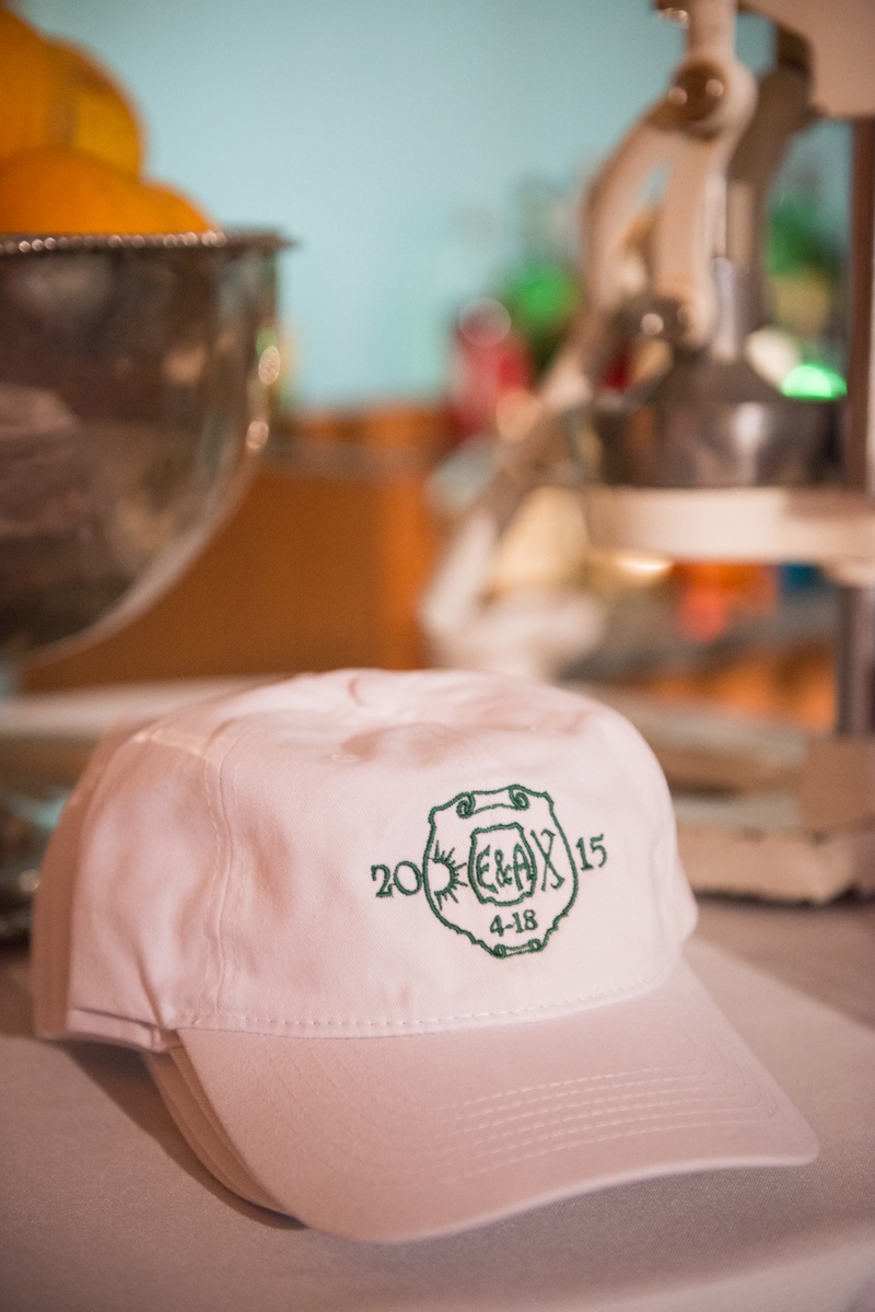 Hat with Custom Camp Logo as Wedding Favor
Photography: Ira Lippke Studios
Read More:
http://www.insideweddings.com/weddings/chic-classic-new-york-city-wedding-with-personal-touches/783/ couple's favors were pink hats with custom logos embroidered to honor childhood camp where they met