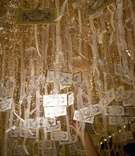 Golden Escort Card Display
Photography: John Solano Photography
Read More:
http://www.insideweddings.com/weddings/lavish-los-angeles-wedding-with-muted-hues/281/ Gold-rimmed seating cards hanging from crystals