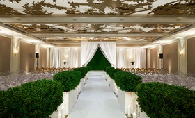 Hedge Wall %26 Draped Chuppah
Photography: Regeti's Photography
Read More:
http://www.insideweddings.com/weddings/elegant-wedding-with-ivory-gold-green-palette-in-washington-dc/1174/ wedding ceremony ballroom gold ceiling hedge along aisle hedge wall backdrop white drapery