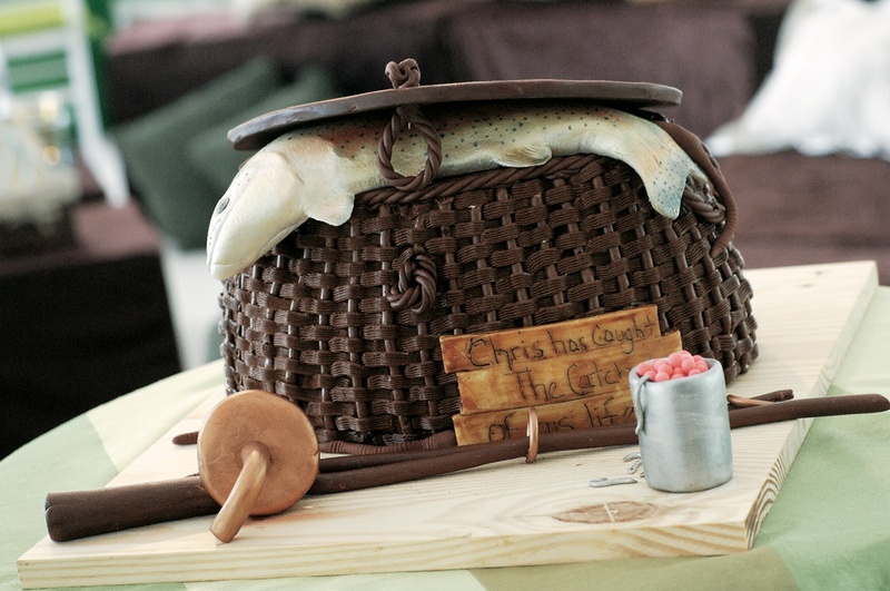Groom's Cake
Photography: Sherman Chu Photographer
Read More:
http://www.insideweddings.com/weddings/elegant-garden-style-vineyard-wedding-in-sonoma-california/205/ Groom's cake of fishing basket with fish and fishing pole