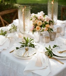 Elegant White %26 Gold Sweetheart Table
Photography: Liz Banfield
Read More:
http://www.insideweddings.com/weddings/destination-fete-with-chapel-ceremony-charming-tented-reception/1179/ wedding reception square sweetheart table white linen tablecloth white cutout plates gold flatware
