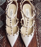 Valentino Wedding Heels
Photography: Yvette Roman
Read More:
http://www.insideweddings.com/weddings/a-classic-wedding-with-rustic-touches-at-a-villa-in-santa-barbara/674/ Valentino stud strappy pumps for bride at reception
