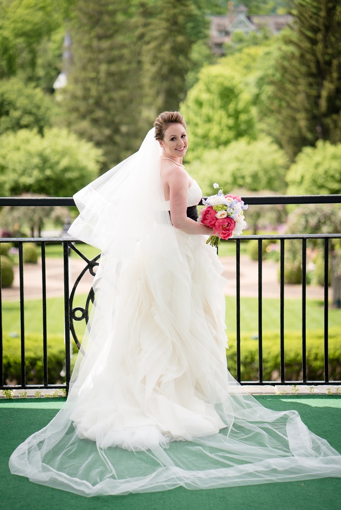 Bride with Gown, Black Sash, Posing
Photography: Karlisch Photography
Read More:
http://www.insideweddings.com/weddings/southern-wedding-with-pink-color-palette-sentimental-details/976/ bride gown vera wang black sash posing long veil colorful bouquet portrait west virginia wedding