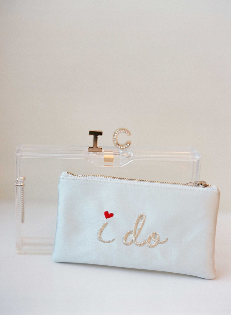 "I Do" White %26 Lucite Clutch
Photography: Kat Braman Photography
Read More:
http://www.insideweddings.com/weddings/a-sophisticated-museum-wedding-with-modern-details-in-palm-beach/899/ Wedding day accessories white "I do" clutch embroidery with initial closure Lucite acrylic clutch