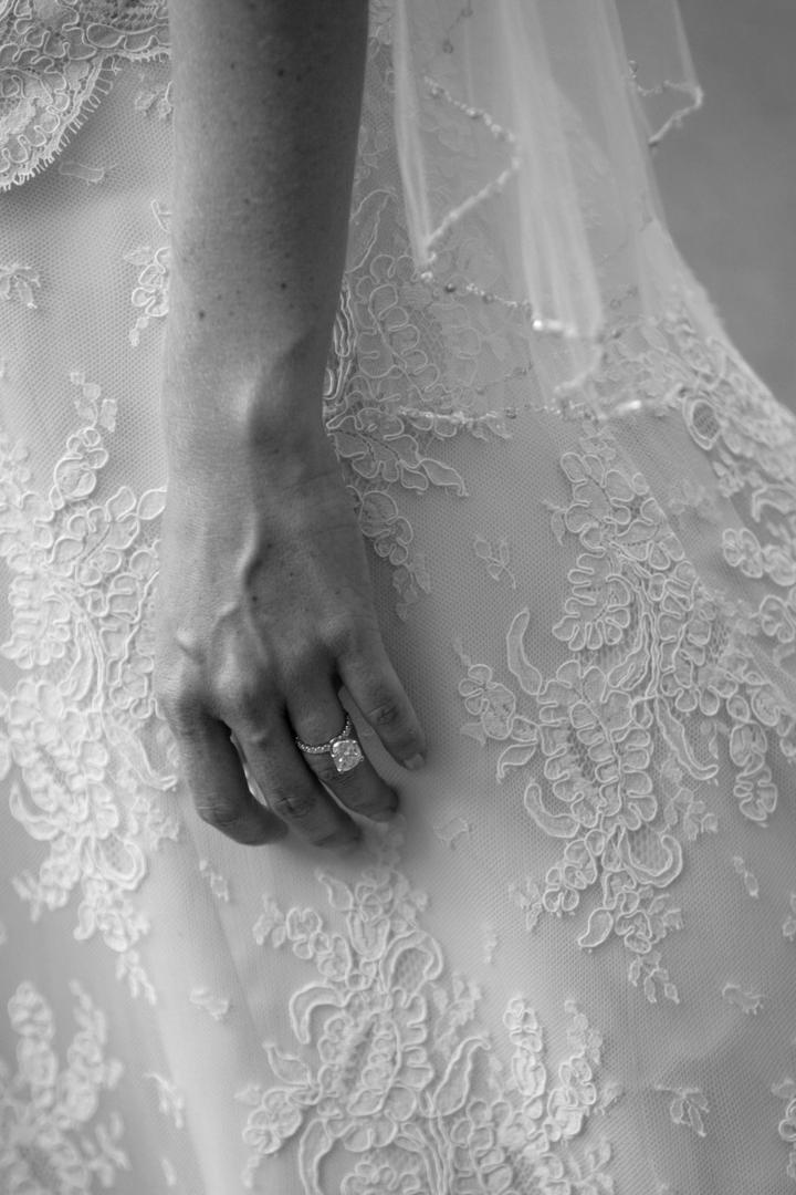 Large Engagement Ring
Photography: Lyn Sims Photographer
Read More:
http://www.insideweddings.com/weddings/glamorous-fall-wedding-with-garden-touches-in-tucson-arizona/258/ Black and white photo of bride's big ring