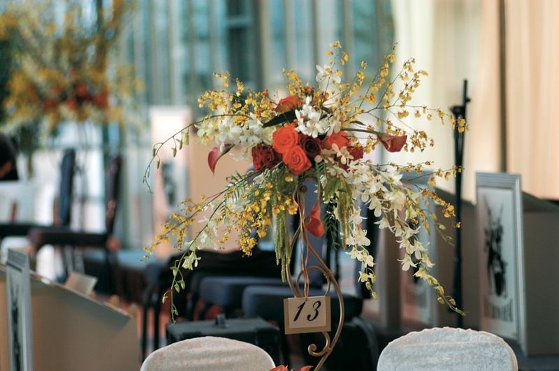 Floral Table Card Display
Photography: Lifetime Images (Steven Schlesinger)
Read More:
http://www.insideweddings.com/weddings/formal-black-tie-wedding-in-la-jolla-california/52/ Iron stand holding table number and flowers