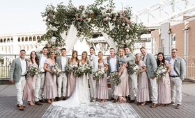 Boho-Chic Bridal Party
Photography: Belle Ombre Photography
Read More:
http://www.insideweddings.com/weddings/vintage-bohemian-inspired-wedding-on-historic-bridge-in-cleveland/1373/ bride and groom on bridge ceremony with bohemian vintage bridesmaid dresses grey groomsmen jackets