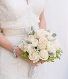 Light-Colored Bridal Bouquet
Photography: Cassi Claire Photography
Read More:
http://www.insideweddings.com/weddings/casually-chic-country-club-wedding-in-new-york-with-pastel-details/662/ Bride in a lace Watters dress with bouquet of white ranunculus, light pink roses, dusty miller