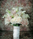 Bouquet of Roses and Calla Lilies
Photography: Jessica Claire Photography
Read More:
http://www.insideweddings.com/weddings/sentimental-ceremony-tented-reception-in-maryland/203/ White and pink roses and calla lilies bouquet wrapped with white fabric