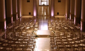 Gold Ceremony in Round
Photography: Sherman Chu Photographer
Read More:
http://www.insideweddings.com/weddings/romantic-wedding-with-green-hues-at-the-bentley-reserve/256/ purple uplighting and gold chairs arranged in the round