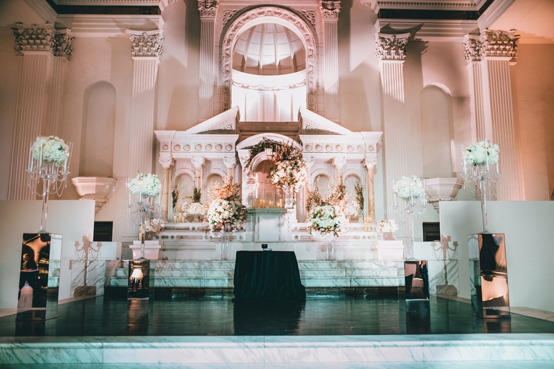 Vibiana Altar with White Flowers
Photography: Jimmy Bui Photography
Read More:
http://www.insideweddings.com/weddings/elegant-edgy-wedding-inspired-by-disney-at-vibiana-in-downtown-la/1229/ wedding ceremony vibiana white flower arrangements and crystal candelabra