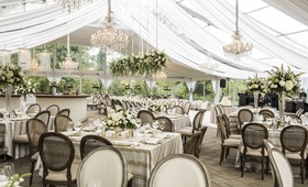 Tented Outdoor Space, Chandeliers, Champagne Hues
Photography: Annette Navarro
Read More:
http://www.insideweddings.com/weddings/romantic-garden-wedding-with-white-green-motif-in-cincinnati/959/ tent outdoor space chandeliers champagne hues wedding reception hanging greenery tan linens