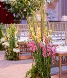 Colorful Flowers Next to Chairs
Photography: Maya Myers Photography
Read More:
http://www.insideweddings.com/weddings/whimsical-wedding-with-colorful-flowers-in-brooklyn-new-york/1131/ Wedding ceremony gold chairs flowers pink yellow greenery growing from ground