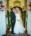 The Bride and Groom
Photography: Adrienne Page
Read More:
http://www.insideweddings.com/weddings/pink-and-white-destination-wedding-in-charleston-south-carolina/542/ Newlyweds standing in doorway of ceremony church