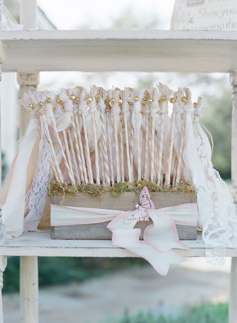 Wedding Wands with Vintage Ribbons
Photography: Elizabeth Messina
Read More:
http://www.insideweddings.com/weddings/fairy-tale-wedding-with-enchanted-forest-theme-in-santa-barbara/778/ Wood box on bookshelf with lace vintage ribbon wands for ceremony kiss