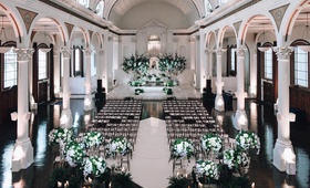 Ceremony in Vibiana
Photography: Fitz Carlile Photography
Read More:
http://www.insideweddings.com/weddings/luxurious-wedding-with-personalized-details-in-downtown-los-angeles/1355/ vibiana indoor wedding ceremony, indoor wedding with white and green floral arrangements