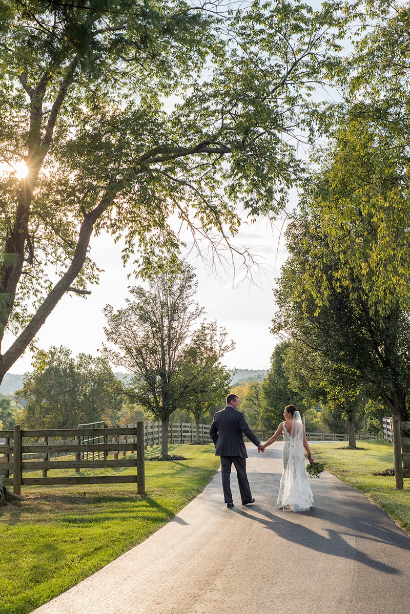 Spring Hill Farm Wedding
Photography: Stacy Newgent
Read More:
http://www.insideweddings.com/weddings/rustic-barn-wedding-tented-reception-on-family-farm-in-ohio/690/ Bride in Alvina Valenta wedding dress with husband on farm