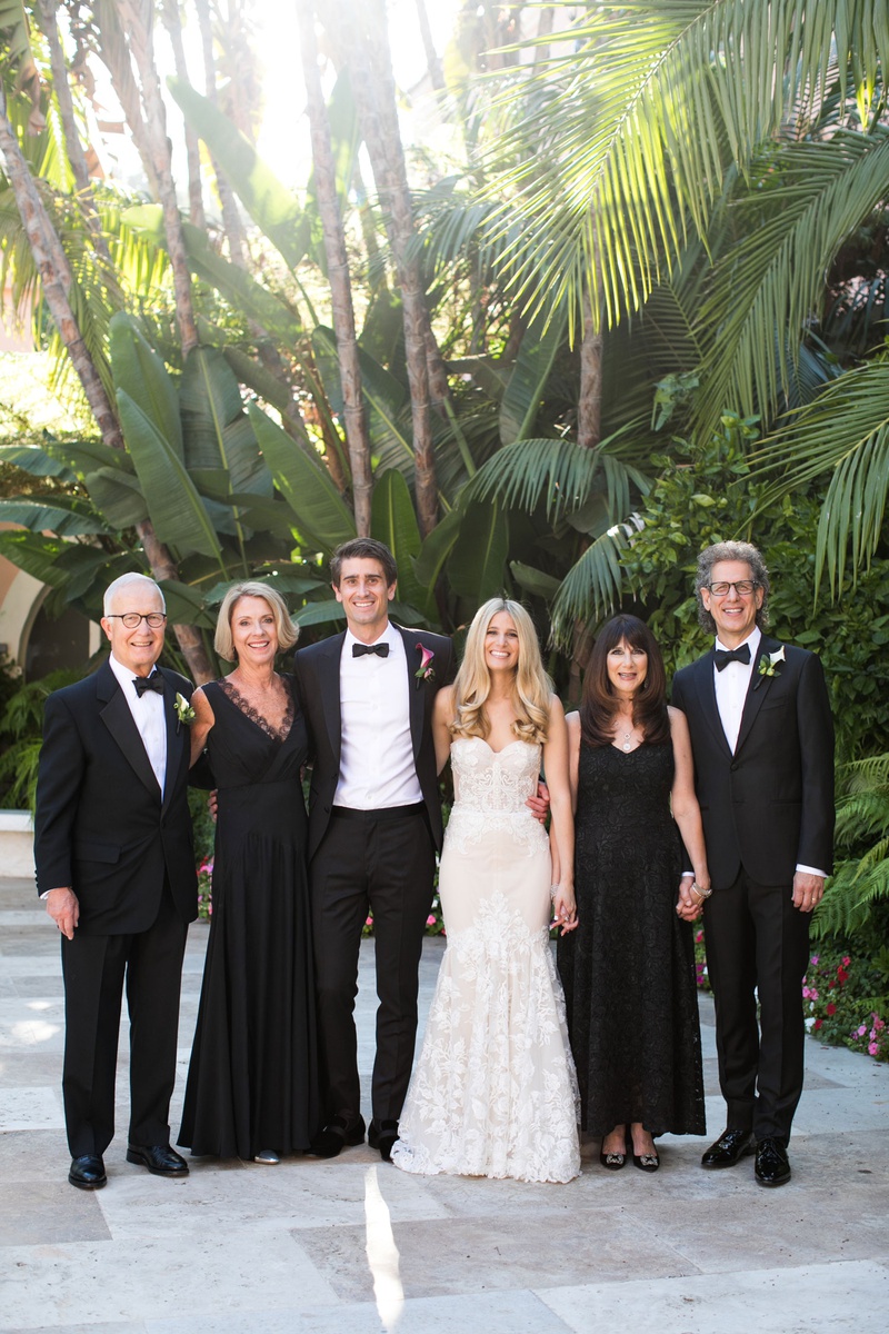 Bride %26 Groom with Families in Bel-Air
Photography: Samuel Lippke Studios
Read More:
http://www.insideweddings.com/weddings/tuscany-meets-rustic-california-outdoor-wedding-under-the-stars/1336/ wedding photo of bride in inbal dror wedding dress groom tuxedo parents in black white attire luxury
