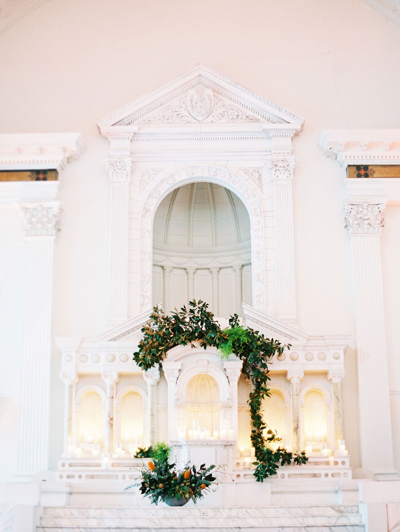 Vibiana Altar with Lush Greenery
Photography: Mallory Dawn Photography
Read More:
http://www.insideweddings.com/weddings/outdoor-jewish-ceremony-luxe-reception-at-vibiana-in-downtown-la/1259/ wedding venue vibiana white marble altar decorated with greenery vines pillar candles