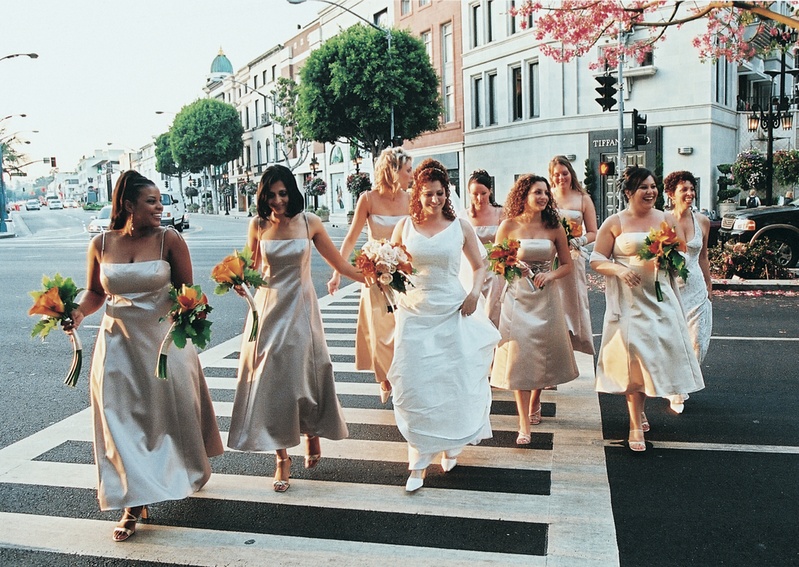 Bride and Bridesmaids Cross Street
Photography: Stephanie Ellis Photography
Read More:
http://www.insideweddings.com/weddings/fall-inspired-wedding-in-beverly-hills-california/41/ Neutral bridesmaid dresses and orange flowers