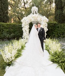 Karoline Starostik %26 Torre Fitz
Photography: Duke Photography
Read More:
http://www.insideweddings.com/weddings/luxurious-alfresco-ceremony-ballroom-reception-in-beverly-hills/1161/ Bride in marchesa couture wedding dress groom in suit at beverly hills hotel wedding outdoor garden