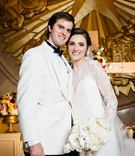 NYE Texas Wedding Couple
Photography: Karlisch Photography
Read More:
http://www.insideweddings.com/weddings/a-festive-new-years-eve-wedding-at-an-art-deco-venue-in-dallas/1053/ Wedding portrait bride and groom in white white bouquet gold texas emblem in background ceremony