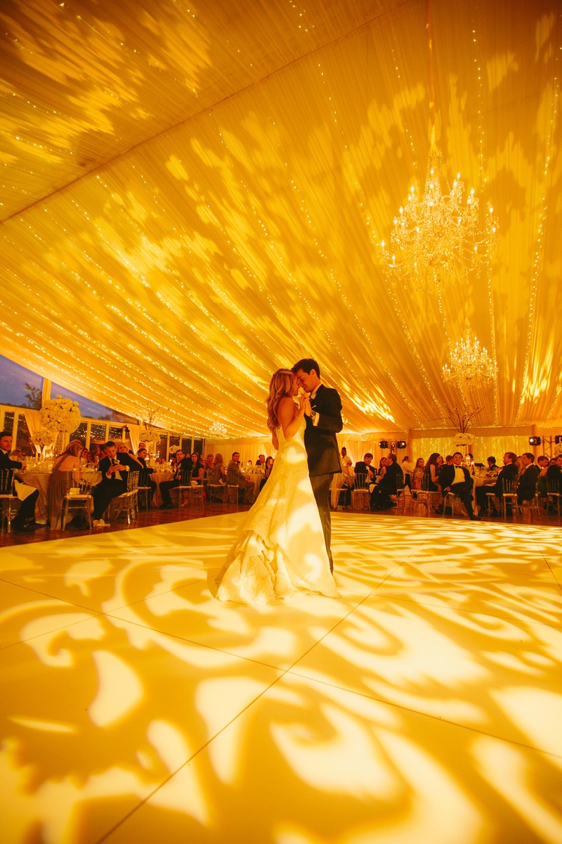 First Dance in Tented Reception
Photography: David %26 Tammy Molnar
Read More:
http://www.insideweddings.com/weddings/an-exquisite-backyard-wedding-in-tennessee/532/ Bride and groom dancing beneath twinkling lights