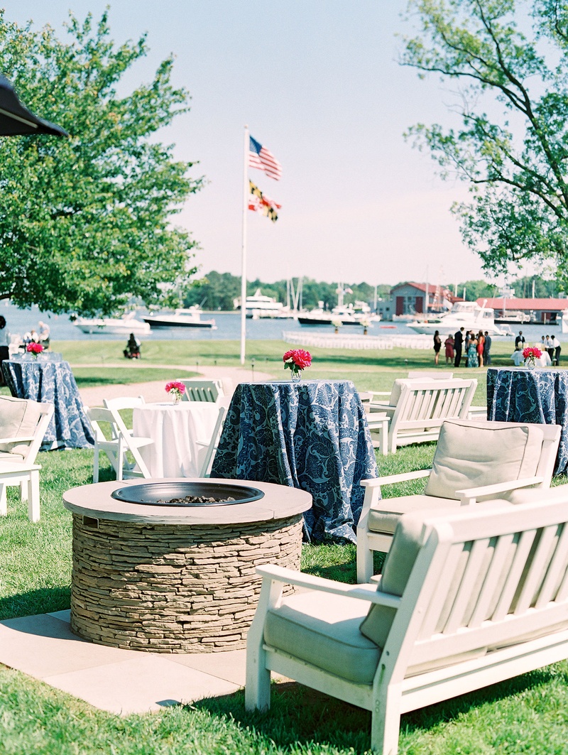 Seating Area on Lawn at Cocktail Hour
Photography: Bonnie Sen Photography
Read More:
http://www.insideweddings.com/weddings/outdoor-ceremony-tented-reception-by-a-tranquil-river-in-maryland/1088/ Seating area and fire pit on lawn at venue river view blue navy linens pink flowers lounge furniture