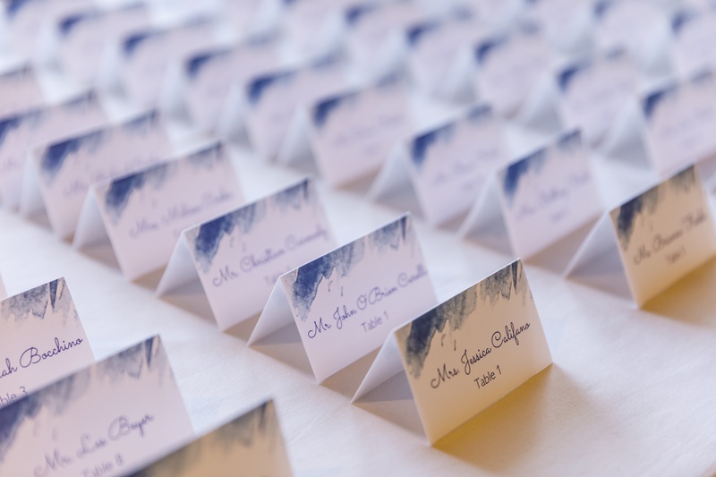 Blue Watercolor Accented Escort Cards
Photography: Amy Anaiz Photography
Read More:
http://www.insideweddings.com/weddings/lakeside-wedding-with-blue-details-in-upstate-new-york/1140/ white escort cards with blue calligraphy and blue watercolor accents