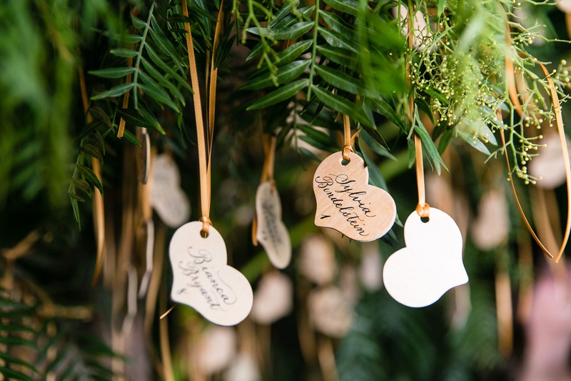 Heart-Shaped Escort Cards on Tree
Photography: Aevitas Weddings
Read More:
http://www.insideweddings.com/weddings/rooftop-ceremony-ballroom-reception-with-english-garden-theme/1286/ wedding reception escort card display live tree with wood heart shape escort cards table numbers