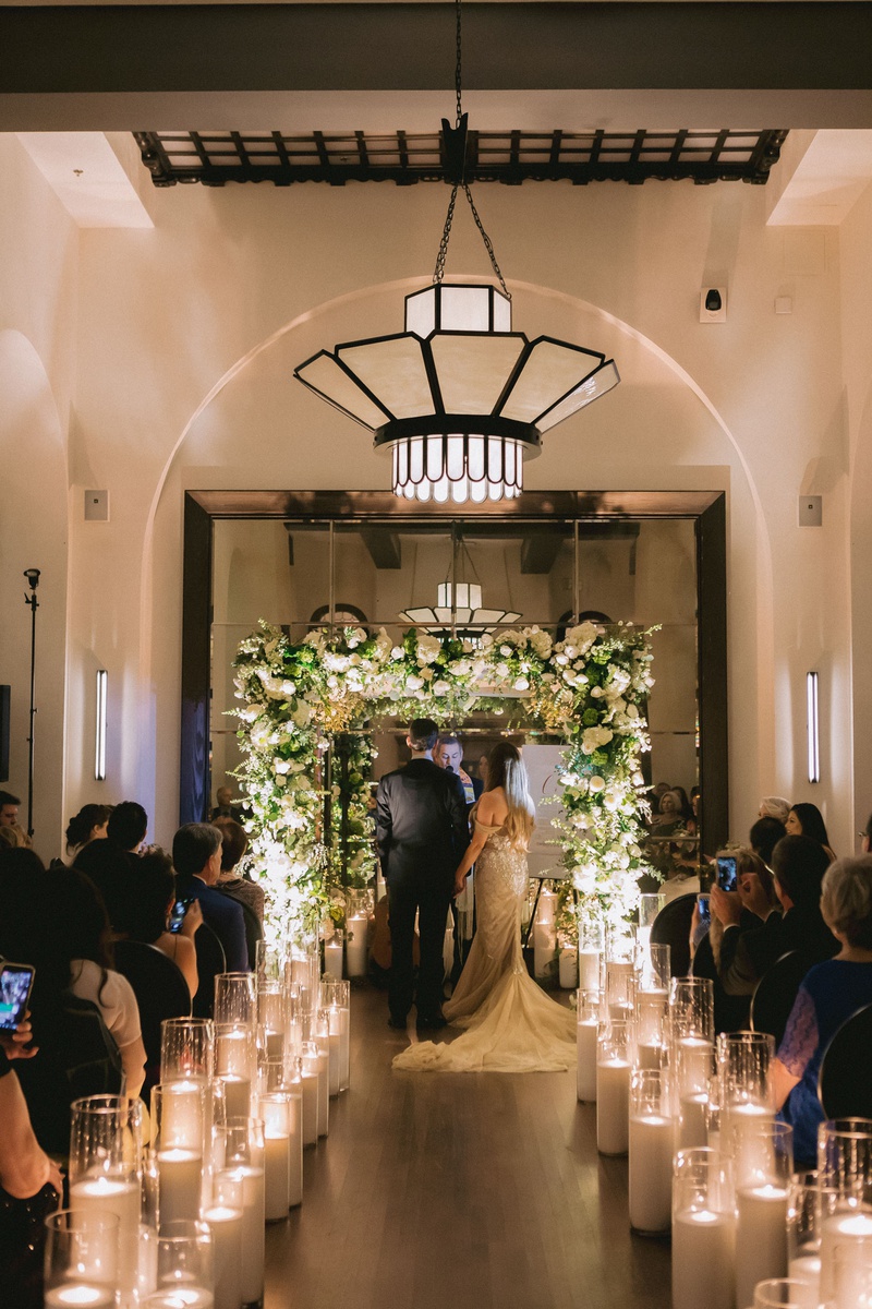 Candlelit Jewish Wedding Ceremony
Photography: Maya Myers Photography
Read More:
http://www.insideweddings.com/weddings/candlelit-jewish-ceremony-unique-cozy-outdoor-reception-in-la/1346/ wedding ceremony hotel figueroa candles lining aisle greenery white flower chuppah