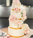 Ivory %26 Gold Cake with Fresh Pink Blooms
Photography: Lauren Gabrielle Photography
Read More:
http://www.insideweddings.com/weddings/nfl-player-mitchell-schwartzs-luxe-wedding-at-a-historical-venue/1265/ four layer wedding cake with gold border and fresh flowers pink garden roses cascading down from top
