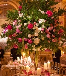 Tree-Like Centerpiece with Pink Flowers
Photography: Ira Lippke Studios
Read More:
http://www.insideweddings.com/weddings/opulent-destination-wedding-at-a-luxury-hotel-in-new-york-city/1004/ Wedding reception round table with tall tree centerpiece pink and white flowers amaranthus branches