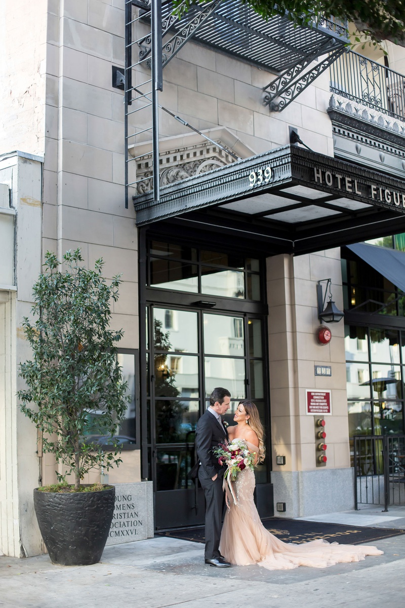 Bride %26 Groom at Downtown Hotel
Photography: Maya Myers Photography
Read More:
http://www.insideweddings.com/weddings/candlelit-jewish-ceremony-unique-cozy-outdoor-reception-in-la/1346/ wedding portrait bride in inbal dror wedding dress fall bouquet hotel figueroa 1920s era downtown la