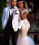 Brittany Nelson %26 Ryan Anderson
Photography: Alakija Studios
Read More:
http://www.insideweddings.com/weddings/fairy-tale-wedding-with-vibrant-blush-fuchsia-gold-decor/1252/ bride in form fitting mermaid wedding dress with sheer details headband groom in white tuxedo jacket