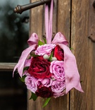 Pink %26 Red Flower Girl Pomander
Photography: Jared Platt Photography
Read More:
http://www.insideweddings.com/weddings/classic-arizona-wedding-of-denver-broncos-nfl-player-brock-osweiler/701/ Round bouquet pomander for flower girl with pink and red roses