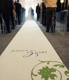 Custom Aisle Runner
Photography: Jenn Barnett Photos
Read More:
http://www.insideweddings.com/weddings/peacock-themed-june-wedding-in-minnesota/283/ Motif and couple names on white runner