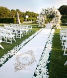 Garden Ceremony
Photography: Brett Matthews Photography
Read More:
http://www.insideweddings.com/weddings/romantic-fairy-tale-castle-wedding-in-new-york/389/ Garden wedding ceremony with white monogrammed aisle runner and white floral arch