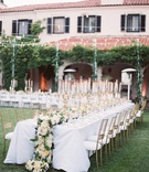 Long Tables, White Linens, Cascading Floral Runner
Photography: Lane Dittoe Photography
Read More:
http://www.insideweddings.com/weddings/charming-wedding-at-california-estate-inspired-by-european-villa/817/ long reception tables white linens gold candelabra cascading floral runner gold chairs