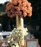 Cocktail Hour Decor
Photography: Jay Lawrence Goldman Photography
Read More:
http://www.insideweddings.com/weddings/a-sophisticated-tented-estate-wedding-in-california/179/ Wedding cocktail table decorated with tall arrangement of roses and short arrangement of peonies
