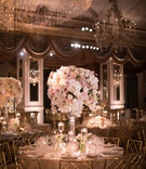 Tall Centerpiece %26 Large Chandelier
Photography: The Day by Ira Lippke
Read More:
http://www.insideweddings.com/weddings/luxurious-fall-wedding-with-pink-elements-in-new-york-city/1166/ wedding reception at the pierre new york glass centerpiece pink rose white orchid tulip glassware
