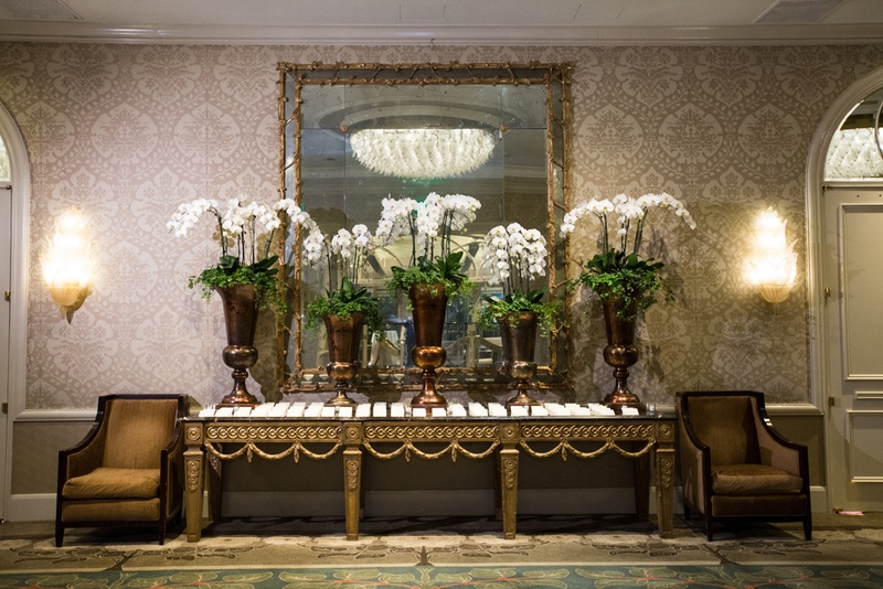 Arrangement of Orchids at Escort Card Table
Photography: Duke Photography
Read More:
http://www.insideweddings.com/weddings/jewish-ceremony-classic-ballroom-reception-in-beverly-hills/922/ five bronze vases with white orchids at escort card table