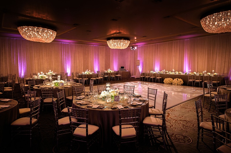 Ballroom with White Dance Floor %26 Lighting
Photography: Next Exit Photography
Read More:
http://www.insideweddings.com/weddings/alfresco-interfaith-ceremony-ballroom-reception-in-santa-monica/963/ Fairmont Miramar Hotel & Bungalows wedding reception pink purple lighting uplighting chandeliers