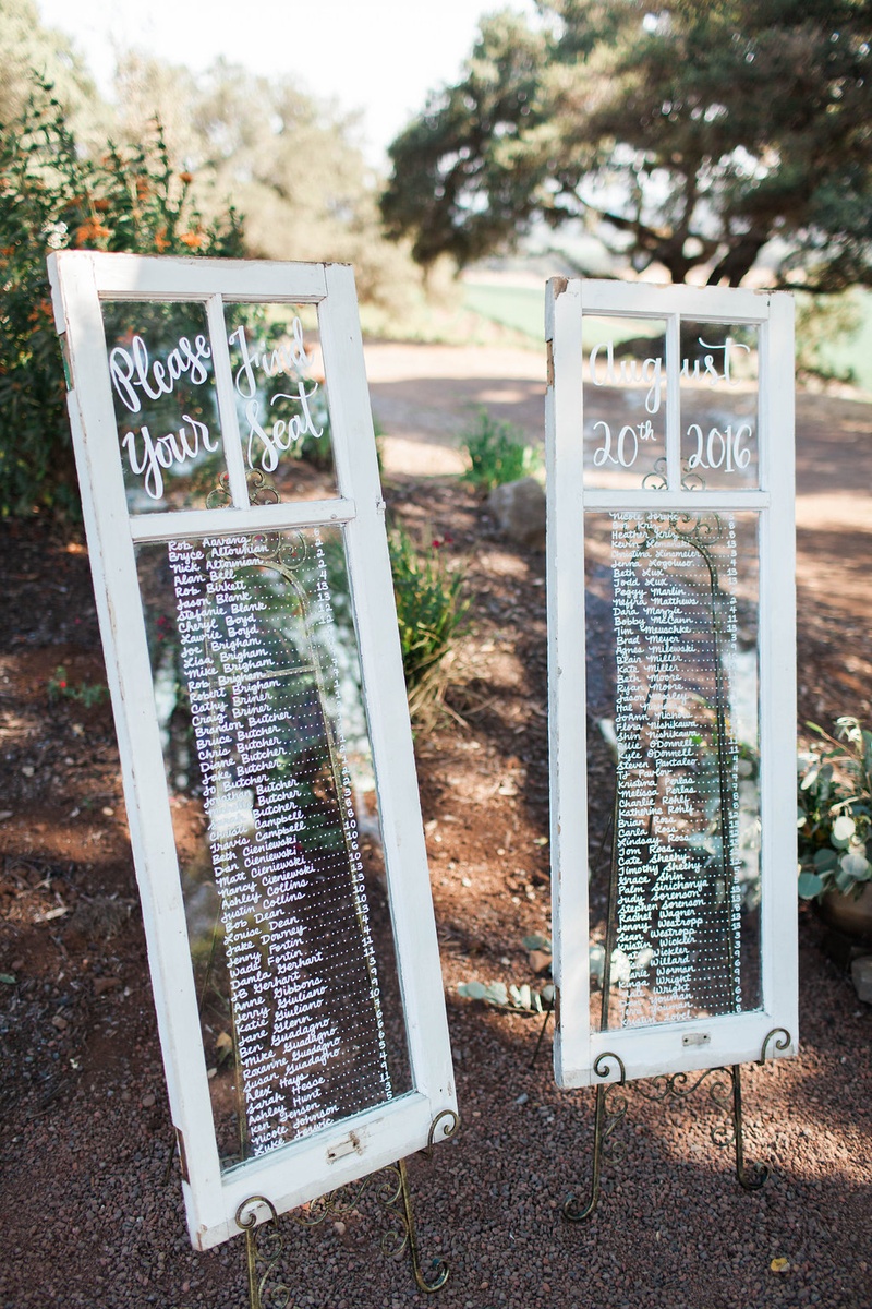 Framed Windows, Seating Charts
Photography: Katie Shuler Photography
Read More:
http://www.insideweddings.com/weddings/rustic-chic-outdoor-wedding-at-a-winery-in-northern-california/945/ framed windows seating charts custom rustic northern california winery wedding reception names