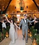 Mr. and Mrs. Hunter Pence
Photography: Mel Barlow %26 Co.
Read More:
http://www.insideweddings.com/weddings/alexis-cozombolidis-and-hunter-pence/1047/ Bride in Monique Lhuillier wedding dress walking down aisle holding hands with Hunter Pence in grey